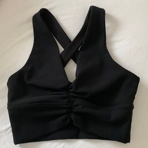 TLF tempo ribbed sports bra, size medium fits smaller. In the color black